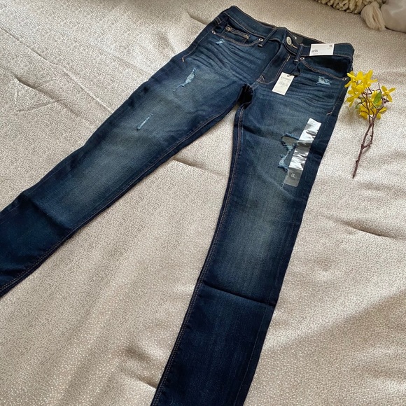 EXPRESS Mid Rise Ripped Jean Leggings - Picture 3 of 9